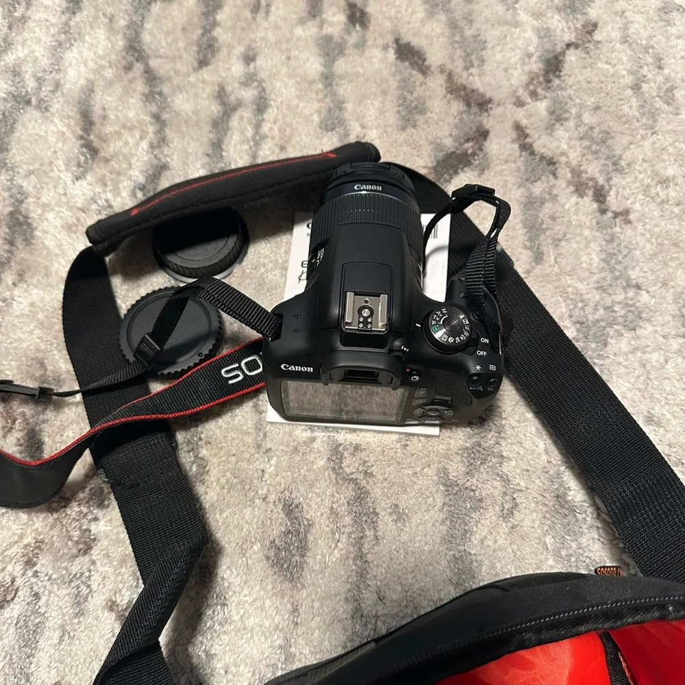 Canon Rebel Camera with Black and Red Case